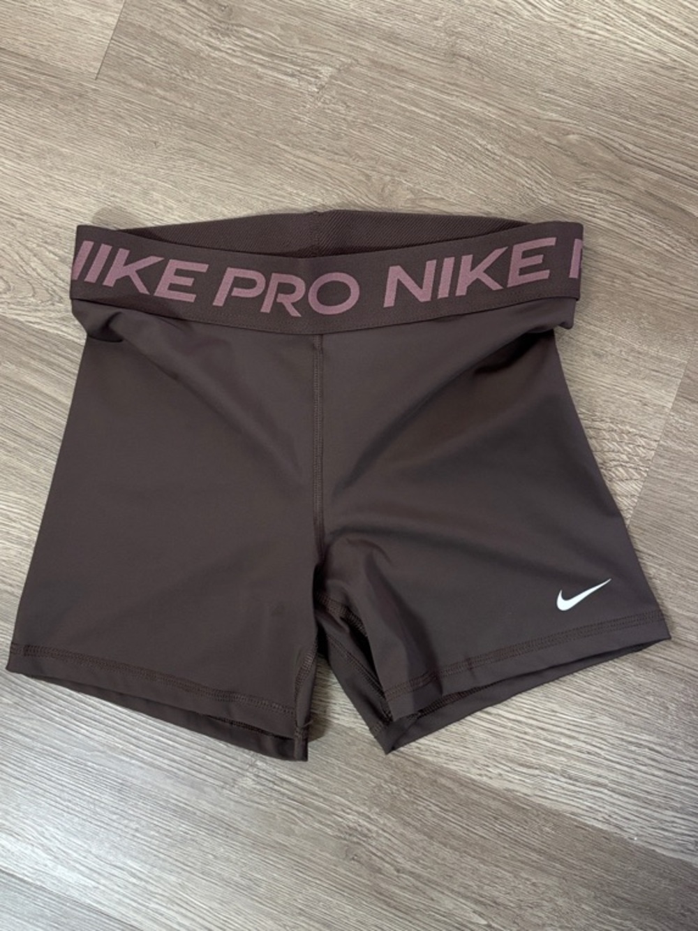 Nike Pro Women's Brown Bike Shorts with Pink Logo Waistband
